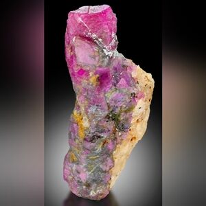 The red pigment comes from the element chromium.© International Colored Gemstone